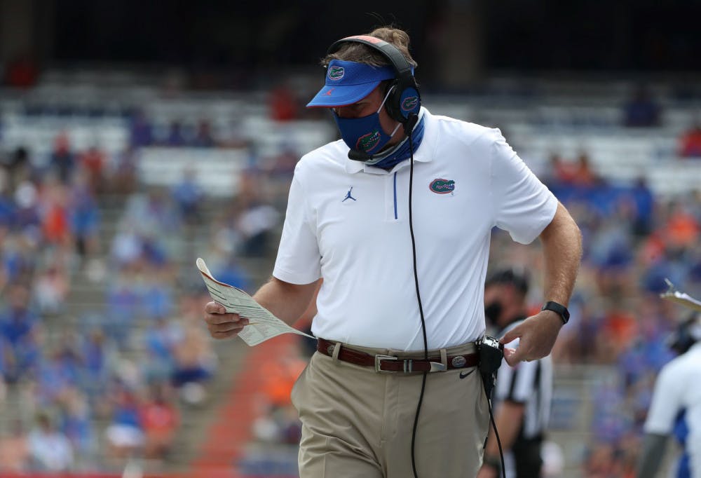 <p>Coach Dan Mullen stands on the sideline at The Swamp for the Gators home opener against South Carolina. Rather than addressing the comments he made regarding stadium capacity over the weekend, Mullen made it clear that his main focus is the upcoming LSU game.</p>