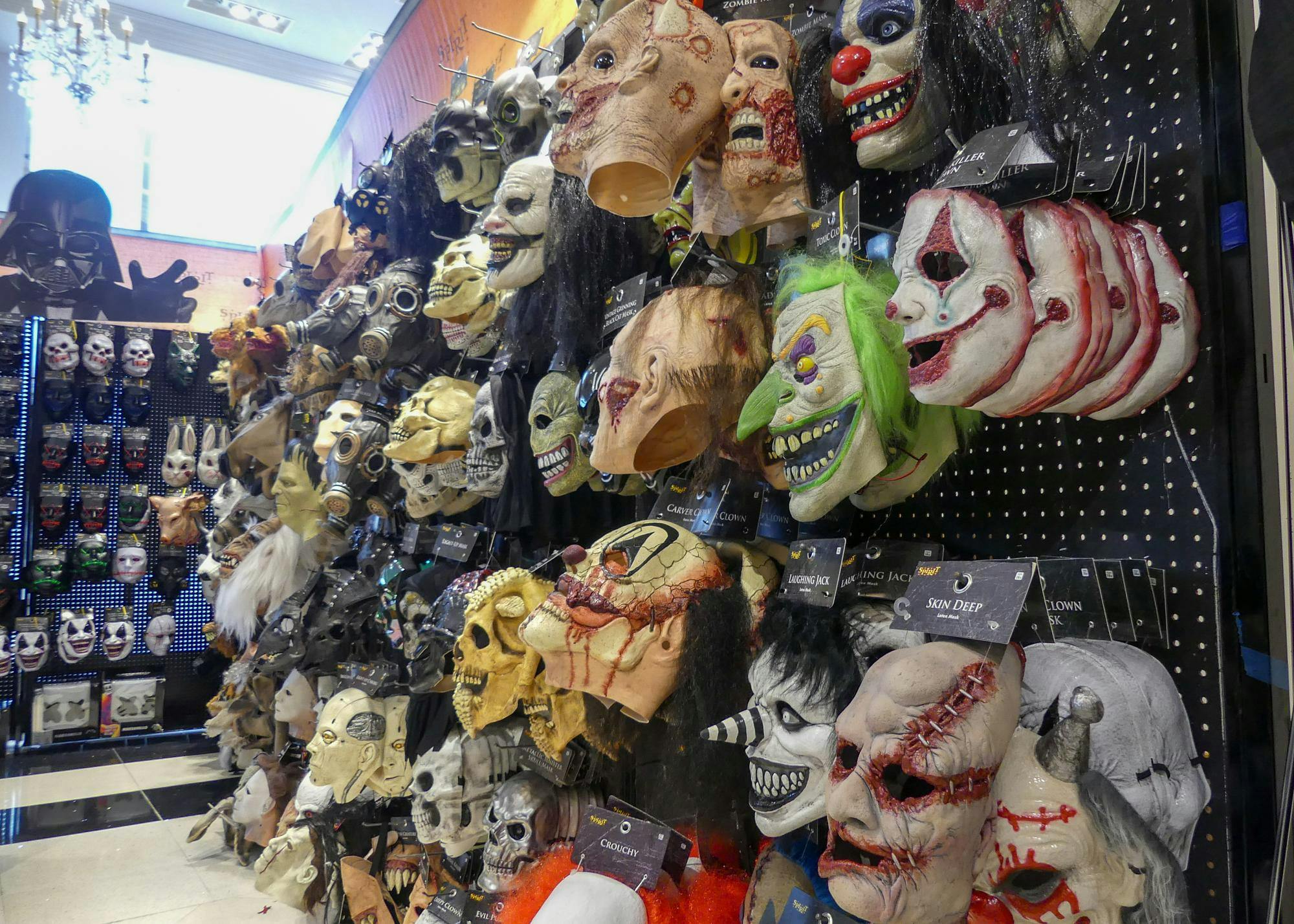 Aisles of Halloween costumes and accessories line the walls at Spirit Halloween in Oaks Mall on Oct. 11, 2025.