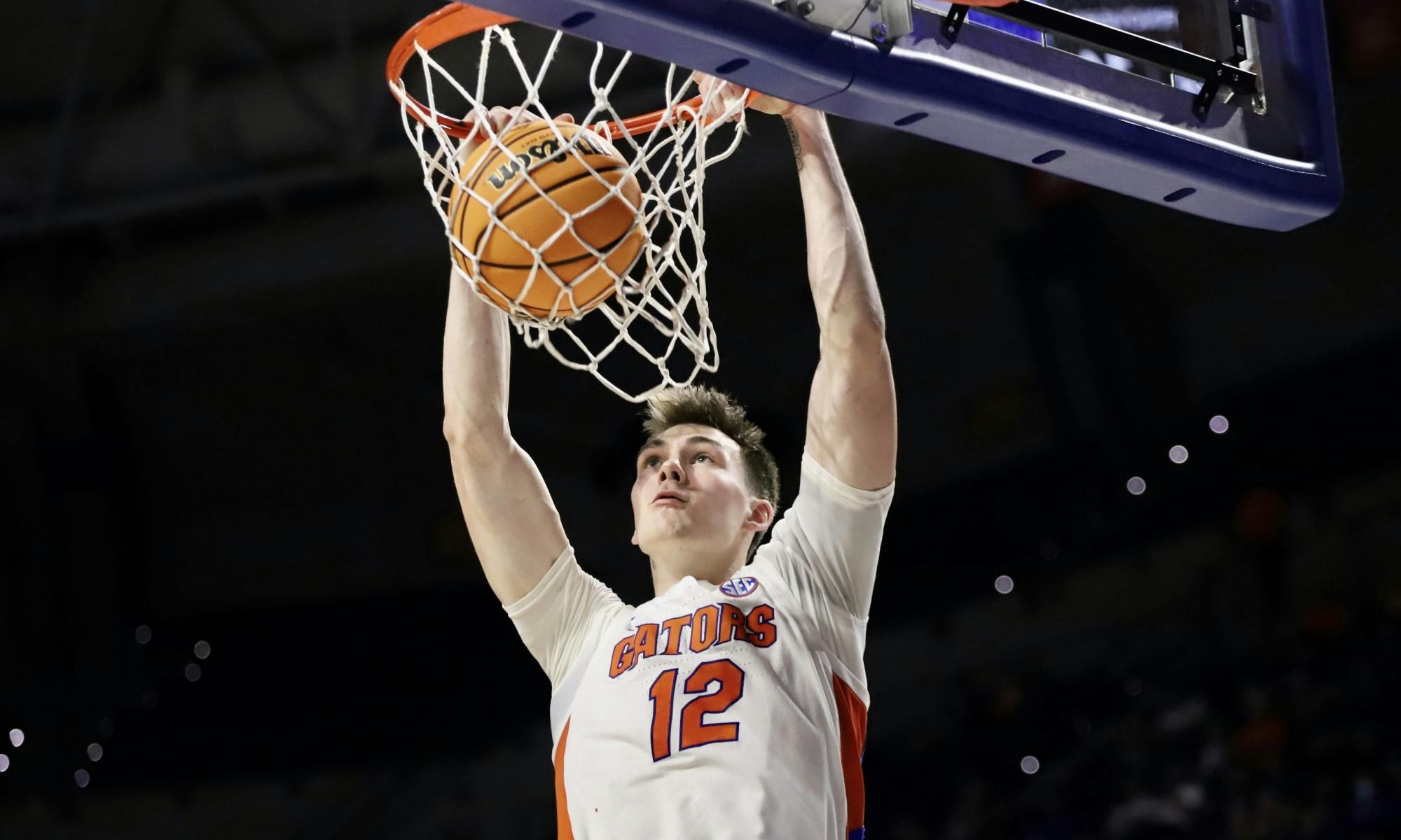 Fifth-year senior Colin Castleton dunks against the Iona Gaels Wednesday, March 16, 2022. 