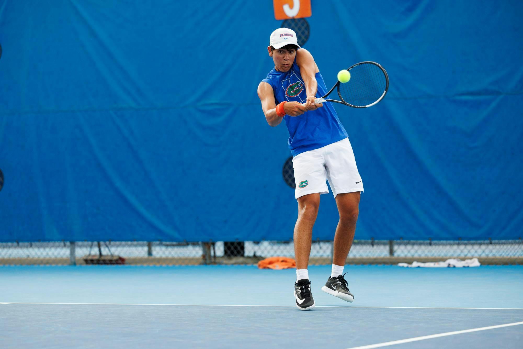 Florida tennis player Andreas Timini hits the ball during an NCAA tennis match against Vanderbilt, Thursday, April 2, 2026, in Gainesville, Fla.