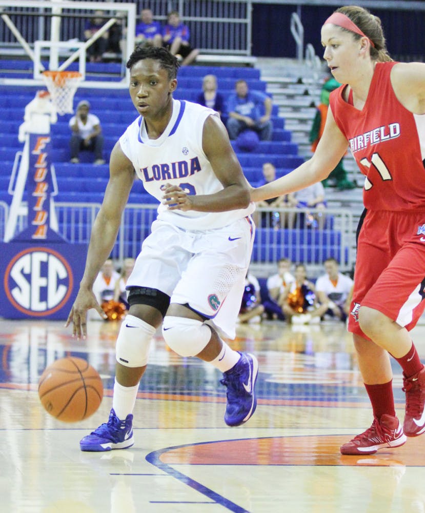 Guard Kayla Lewis (left) drives to the basket against Fairfield’s Brittany MacFarlane in Florida’s 71-49 win on Nov. 9 in the O’Connell Center.

