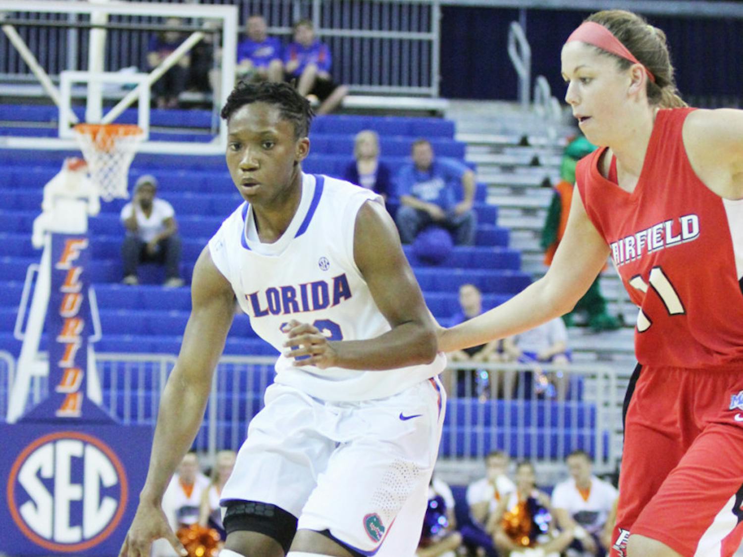 Guard Kayla Lewis (left) drives to the basket against Fairfield’s Brittany MacFarlane in Florida’s 71-49 win on Nov. 9 in the O’Connell Center.
