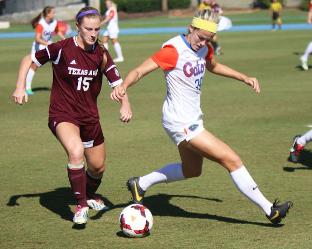 <p>Christen Westphal battles for the ball during Florida’s 2-0 victory against Texas A&amp;M on Sunday afternoon at James G. Pressly Stadium.</p>