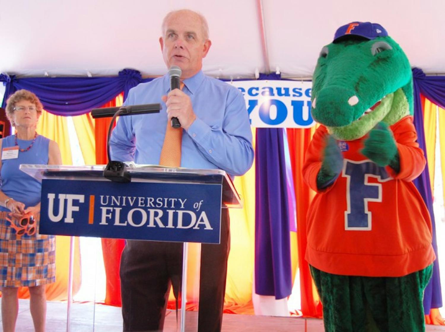 UF President Bernie Machen, seen here speaking in October at the BEAT Lousiana State University T-shirt distribution, is not stepping down from his position at this time.
