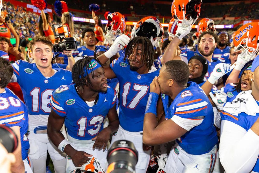 Florida Gators quarterback DJ Lagway (2) and Florida Gators running back Jadan Baugh (13) celebrate after the teams 48-20 win at Steve Spurrier-Florida Field at Ben Hill Griffin Stadium on Saturday, October 19, 2024