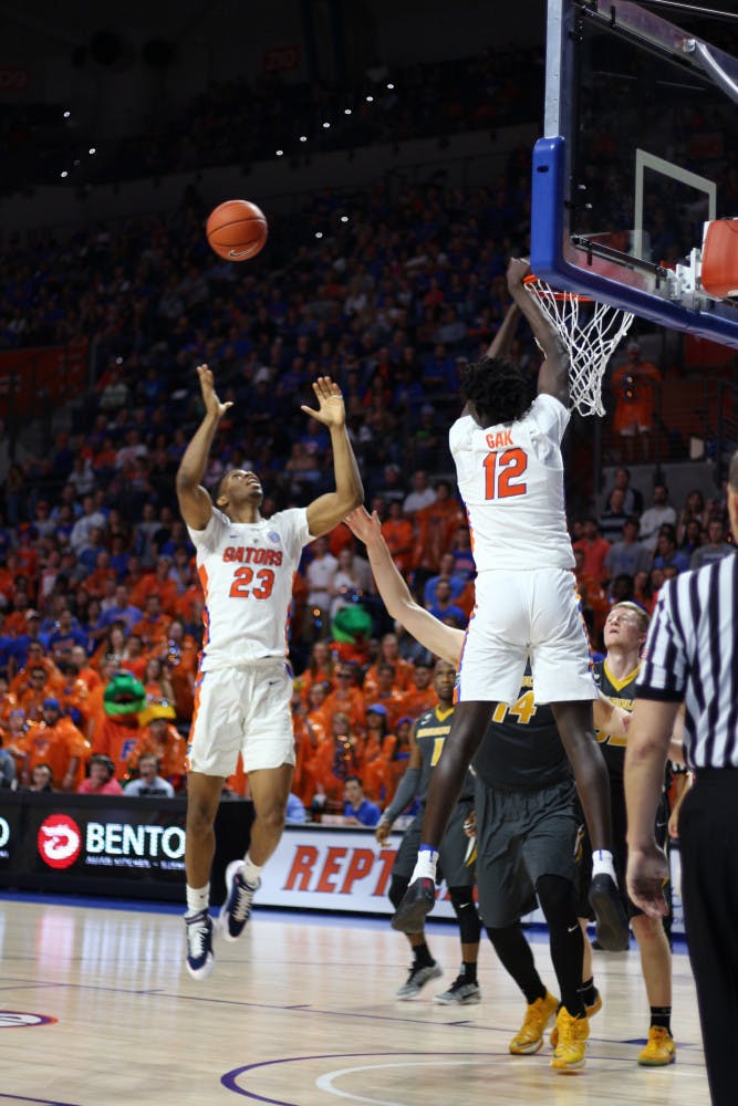 Gorjok Gak (right) is competing for Australia in the World University Games in Taipei. The rising sophomore center had 8 points and 9 rebounds in a two-point win against Lithuania on Monday.