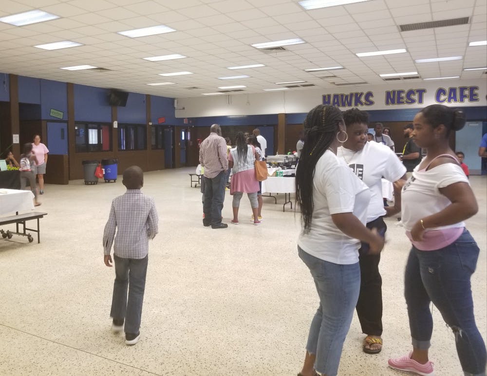 Gainesville residents took a tour of African cuisine while aiming to educate about rising gun violence. 