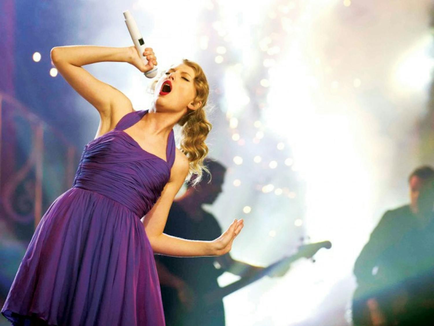 FILE - This Nov. 22, 2011 file photo shows singer Taylor Swift performing at Madison Square Garden in New York. Six-time Grammy winner Taylor Swift will perform at the 2012 MTV Video Music Awards next month. Comedian Kevin Hart will host the VMAs live from the Staples Center in Los Angeles on Sept. 6. (AP Photo/Charles Sykes, file)