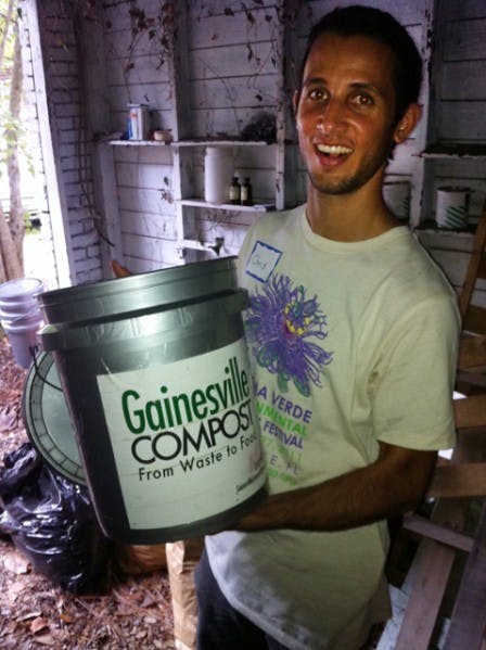 Chris Cano gives 5-gallon buckets like these to businesses to fill with scraps. Cano runs Gainesville Compost out of his home.