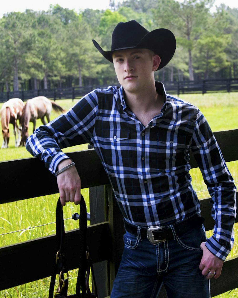 <p>Jeremy White poses for the American Paint Horse Association’s international modeling contest, hoping to be featured in Chrome magazine.</p>