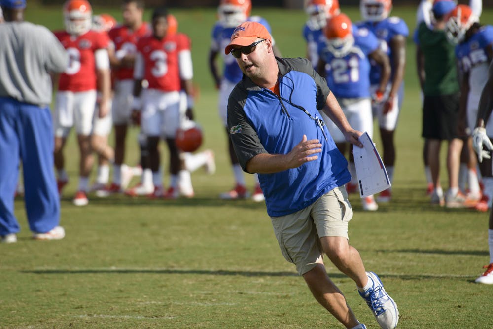 Florida offensive coordinator Kurt Roper during practice on Thursday at Donald R. Dizney Stadium.