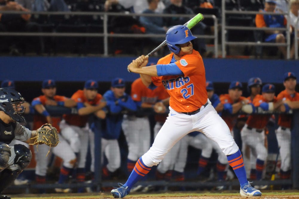 Nelson Maldonado bats during Florida's 5-4 win against North Florida on March 9, 2016, at McKethan Stadium.