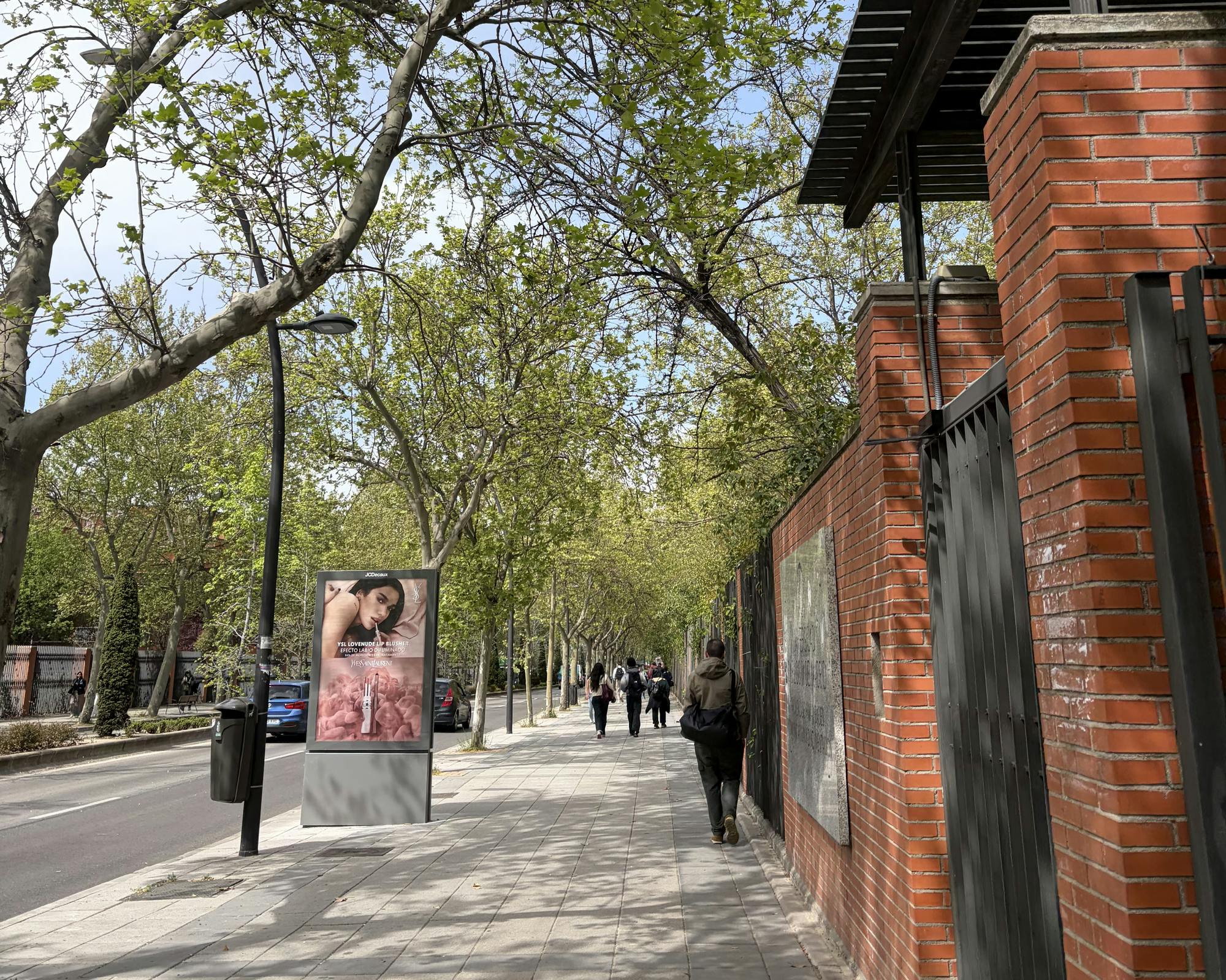 People walk outside Facultad De Humanidades, Comunicación Y Documentación at Universidad Carlos III of Madrid on April 8, 2026 in Getafe, Spain.