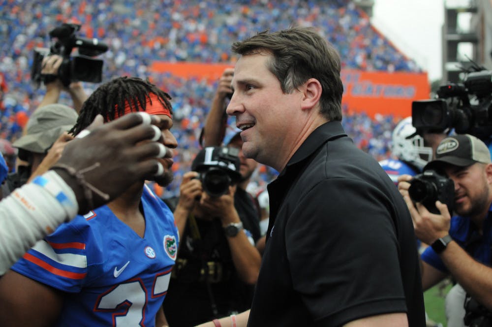 <p>Will Muschamp meets with Florida players after South Carolina's 20-7 loss to UF on Nov. 12, 2016, at Ben Hill Griffin Stadium.</p>