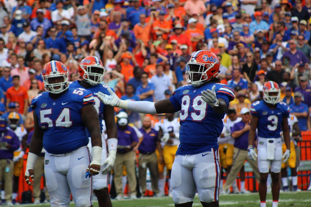 UF defensive end Jachai Polite celebrates during Florida's 17-16 loss to LSU on Saturday at Ben Hill Griffin Stadium.