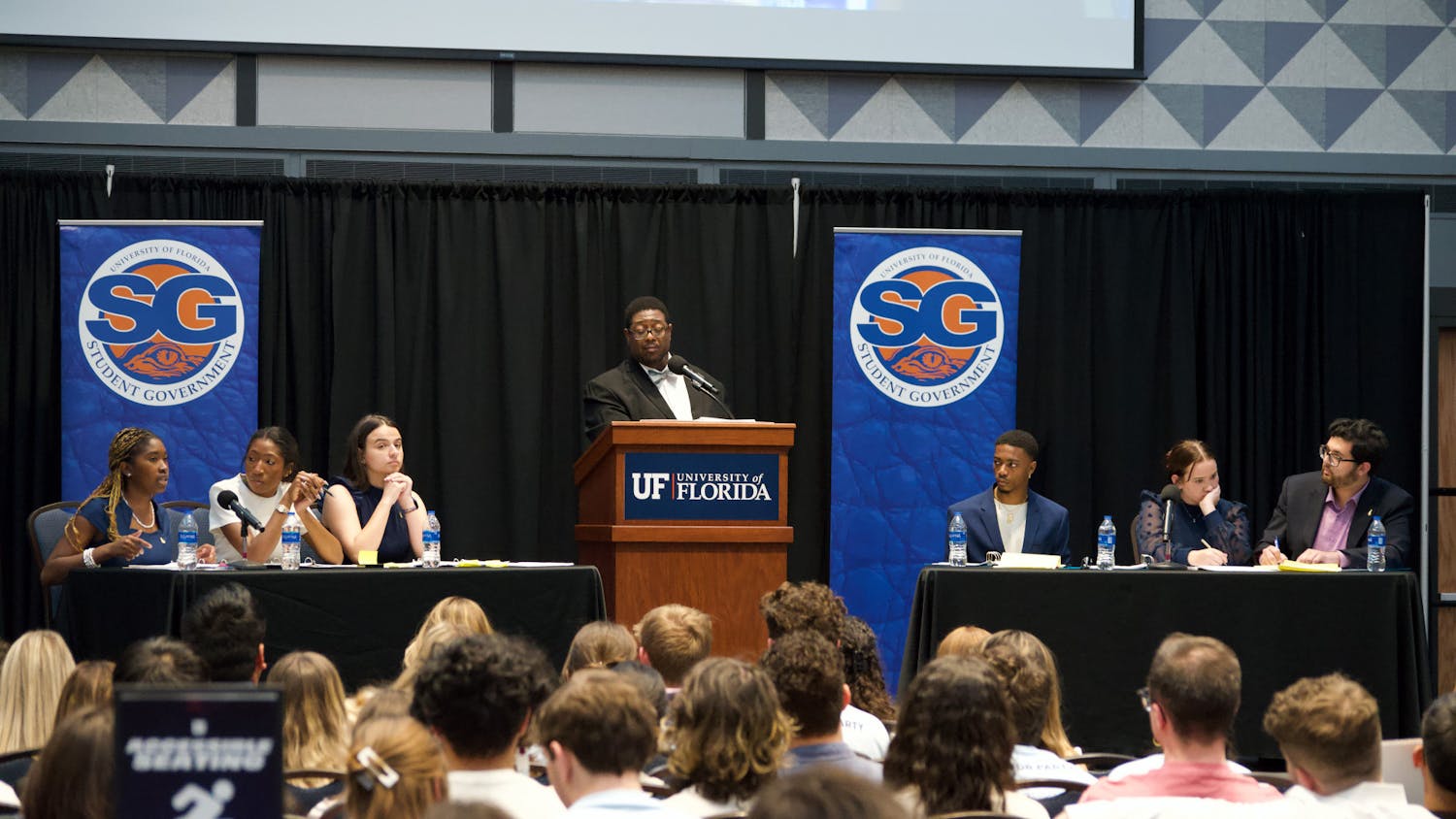 The Change Party and the Gator Party’s candidates for student body president, vice president and treasurer engage in a debate moderated by Marna Weston in the Reitz Union Grand Ballroom Tuesday, Feb. 21, 2023.