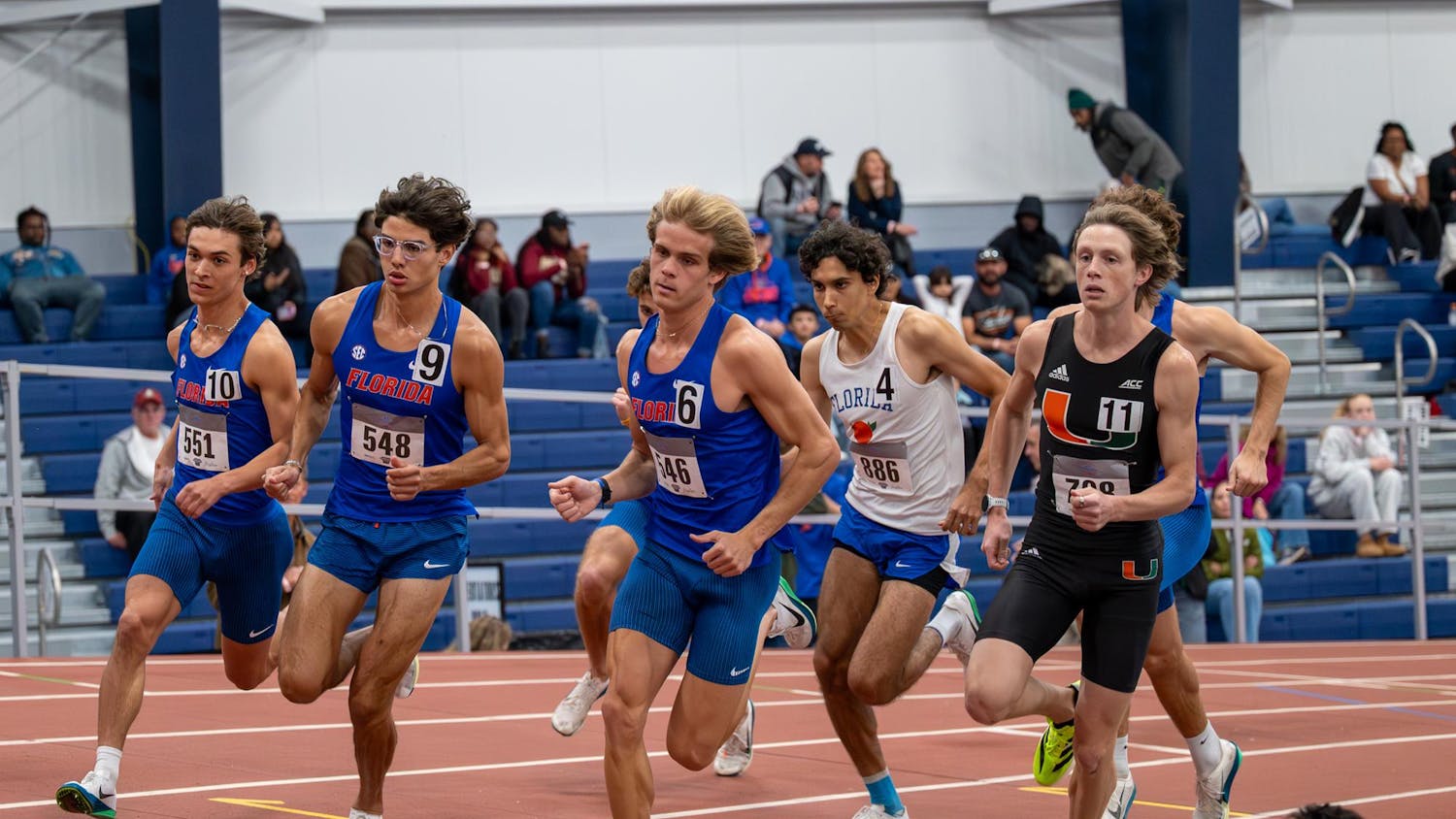 Florida distance runner Riley Smith (left) races in the men’s 1000 during the Jimmy Carnes Invitational in Gainesville, Fla., Friday, Jan. 16, 2026.