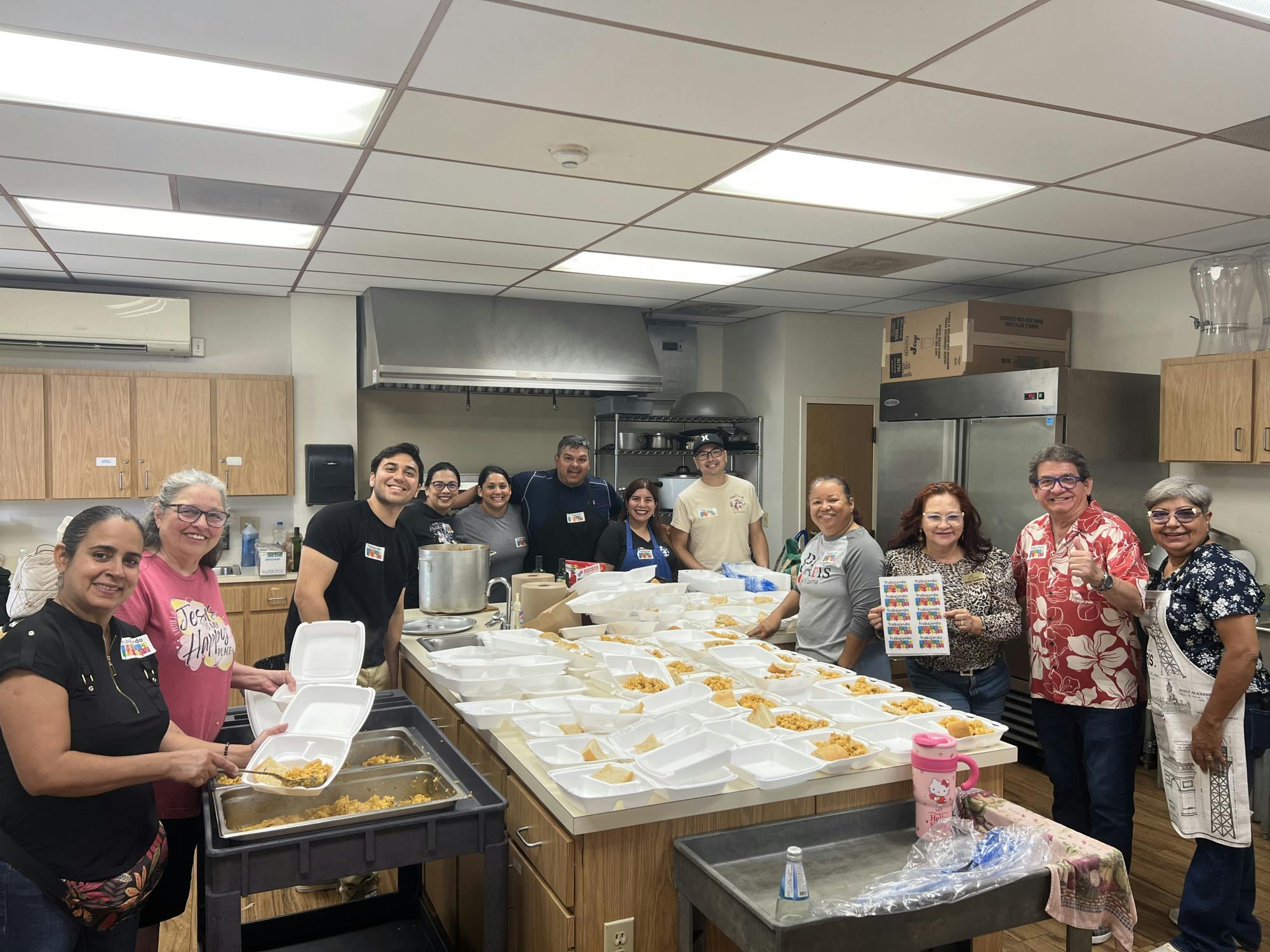 “Trabajando Juntos” volunteers cooking during the free health fair on Saturday, May 18, 2024.