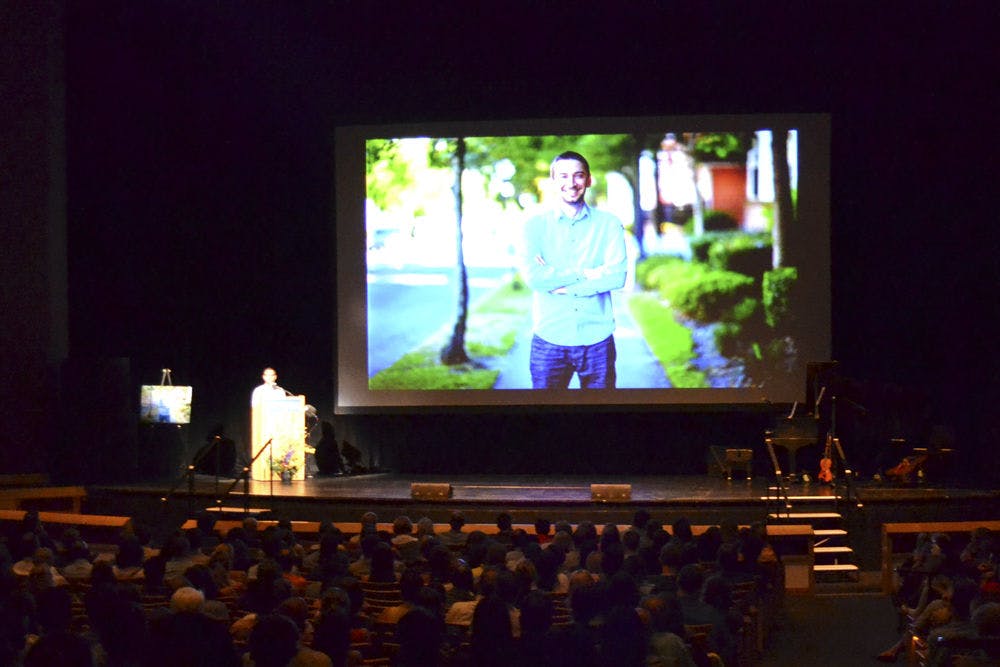 <p>Sam Tarantino (left), co-founder of Grooveshark, a Gainesville-based music streaming service, speaks to family and friends of fellow co-founder Josh Greenberg, who was found dead on July 19.</p>
