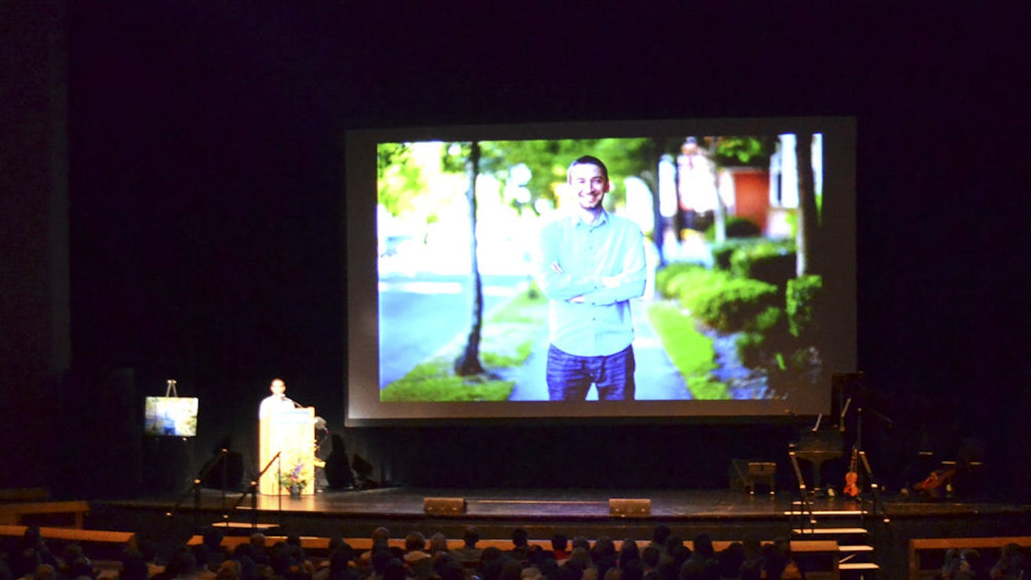Sam Tarantino (left), co-founder of Grooveshark, a Gainesville-based music streaming service, speaks to family and friends of fellow co-founder Josh Greenberg, who was found dead on July 19.