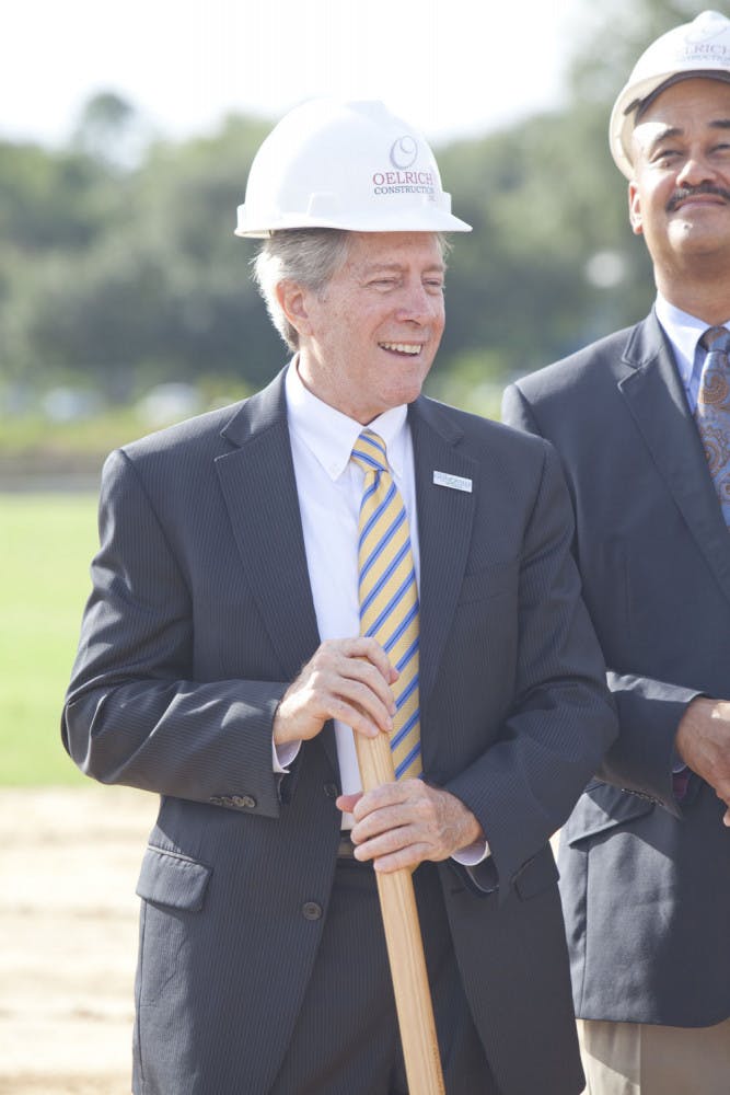 Russ Blackburn, Gainesville city manager, breaks ground on the Depot Park’s renovation and cleanup on Sept. 2, 2015. The park will cost $6 million.