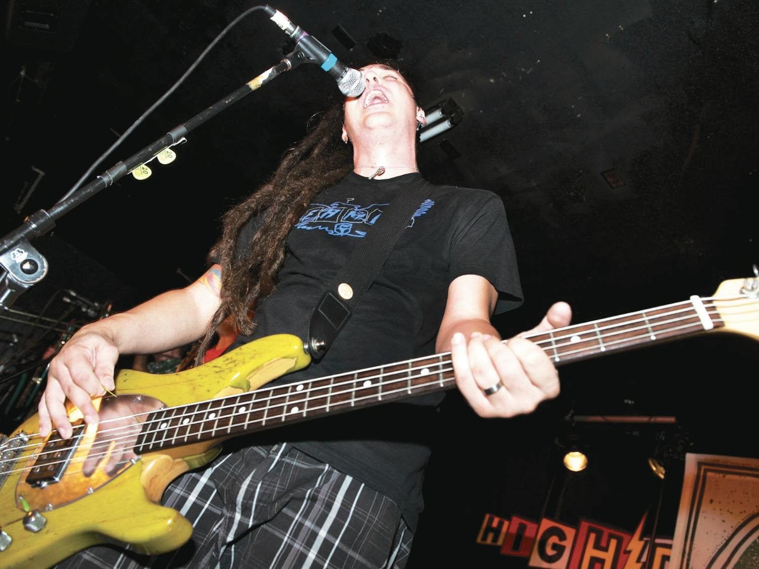 Less Than Jake vocalist and bassist Roger Manganelli plays at the High Dive during the band’s Wake and Bake event in 2012. The band will perform t at the High Dive Aug. 30-Aug. 31.