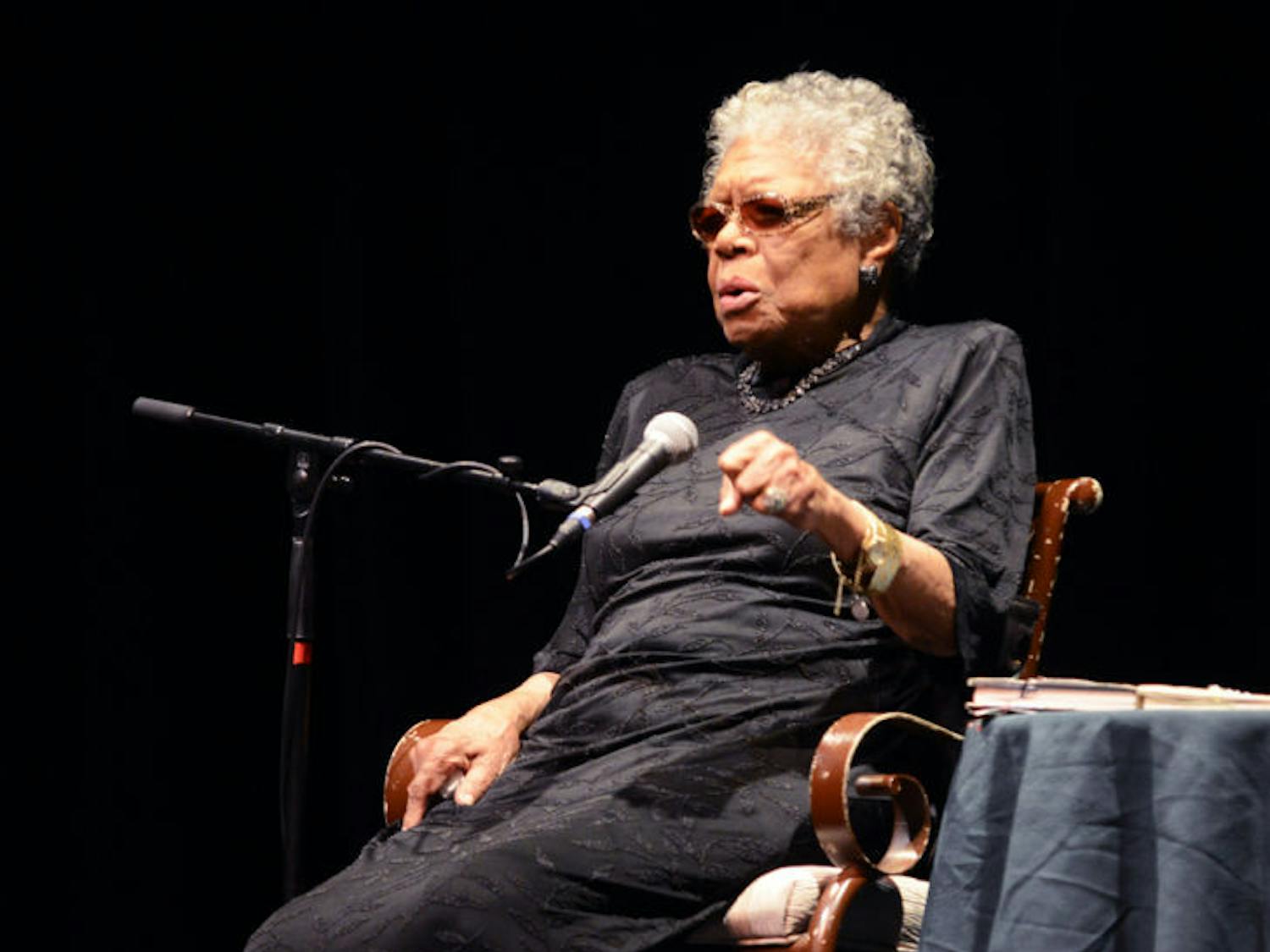 Author and poet Maya Angelou speaks to a crowd at the Phillips Center for the Performing Arts on Wednesday night.