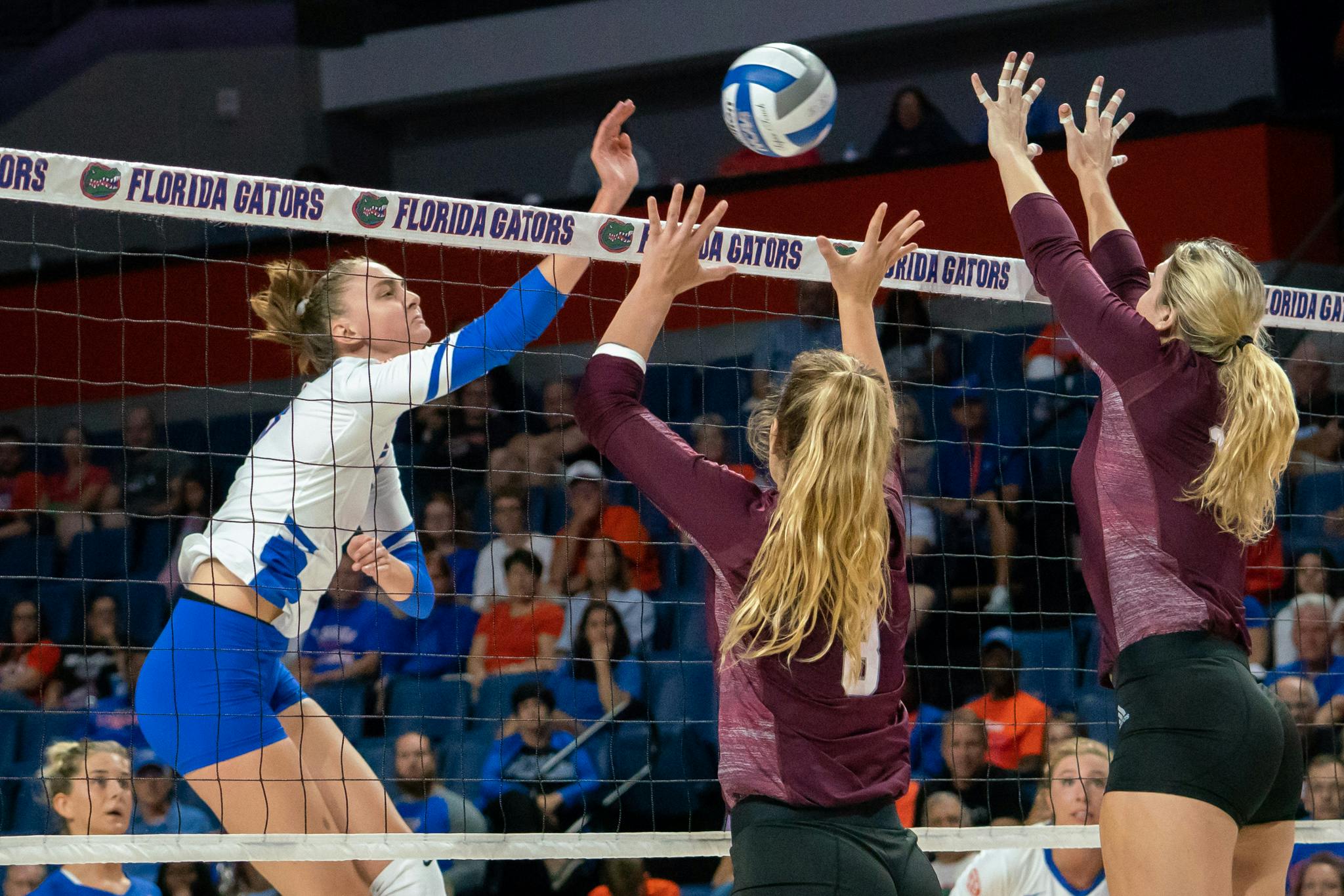 Middle blocker Rachael Kramer (left) and the Gators front court held the Gamecocks to a .088 hitting percentage during the first two sets of Friday night's win. 
