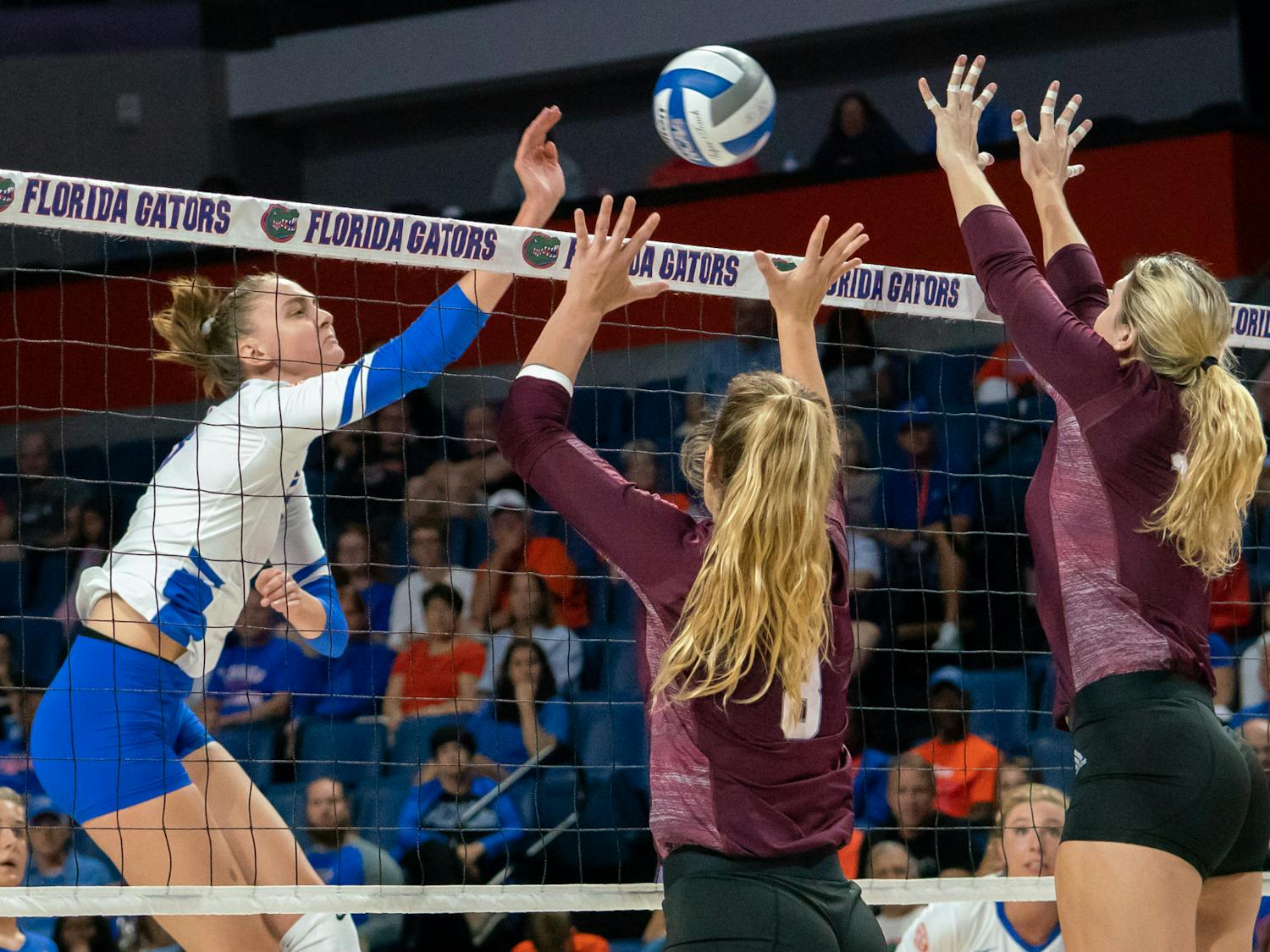 Middle blocker Rachael Kramer (left) and the Gators front court held the Gamecocks to a .088 hitting percentage during the first two sets of Friday night's win. 