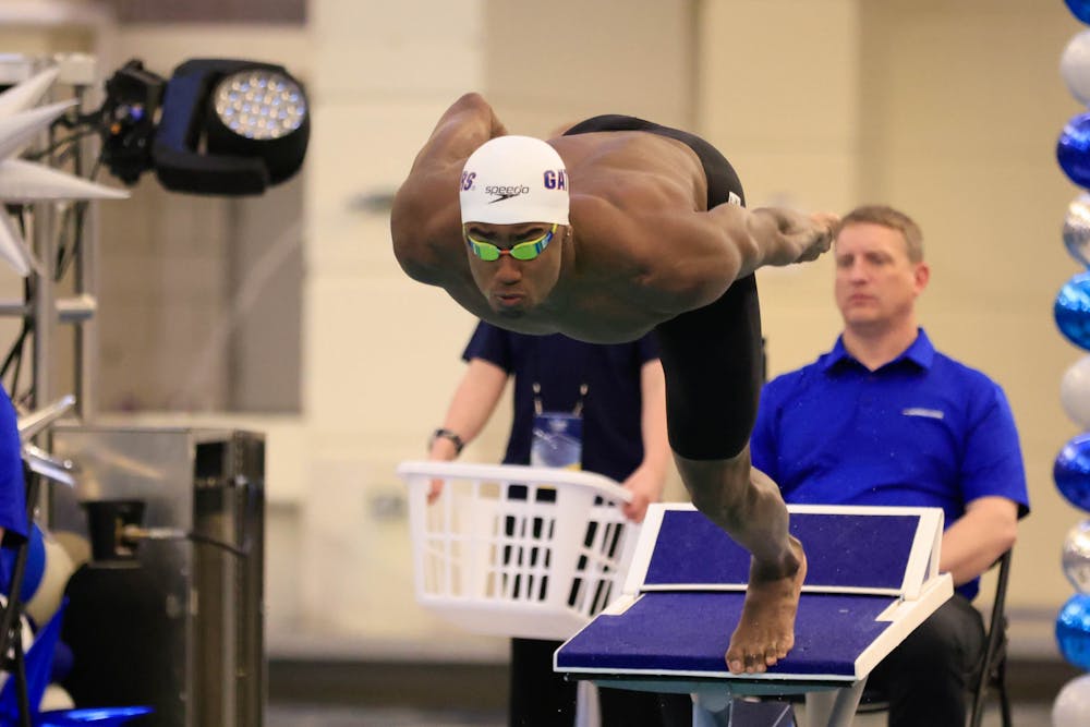 Florida freshman Joshua Liendo competes in a swimming event.