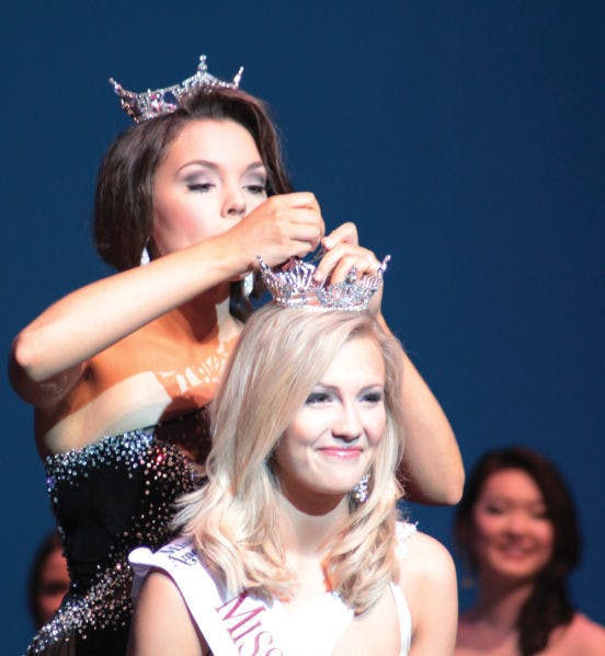 Telecommunication sophomore Elizabeth Fechtel is crowned Miss UF 2014 at the Curtis M. Phillips Center for the Performing Arts on Monday night.