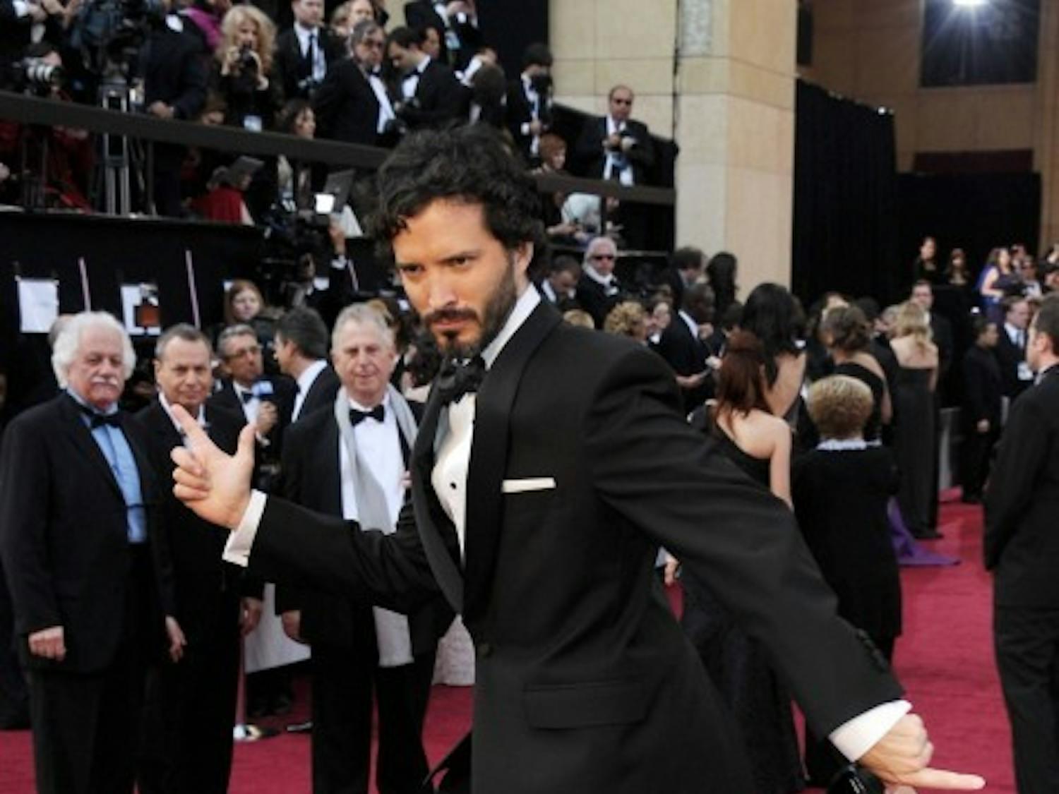 “Conchord” Bret McKenzie arrives at the Oscars ready to have some fun and take home an award.