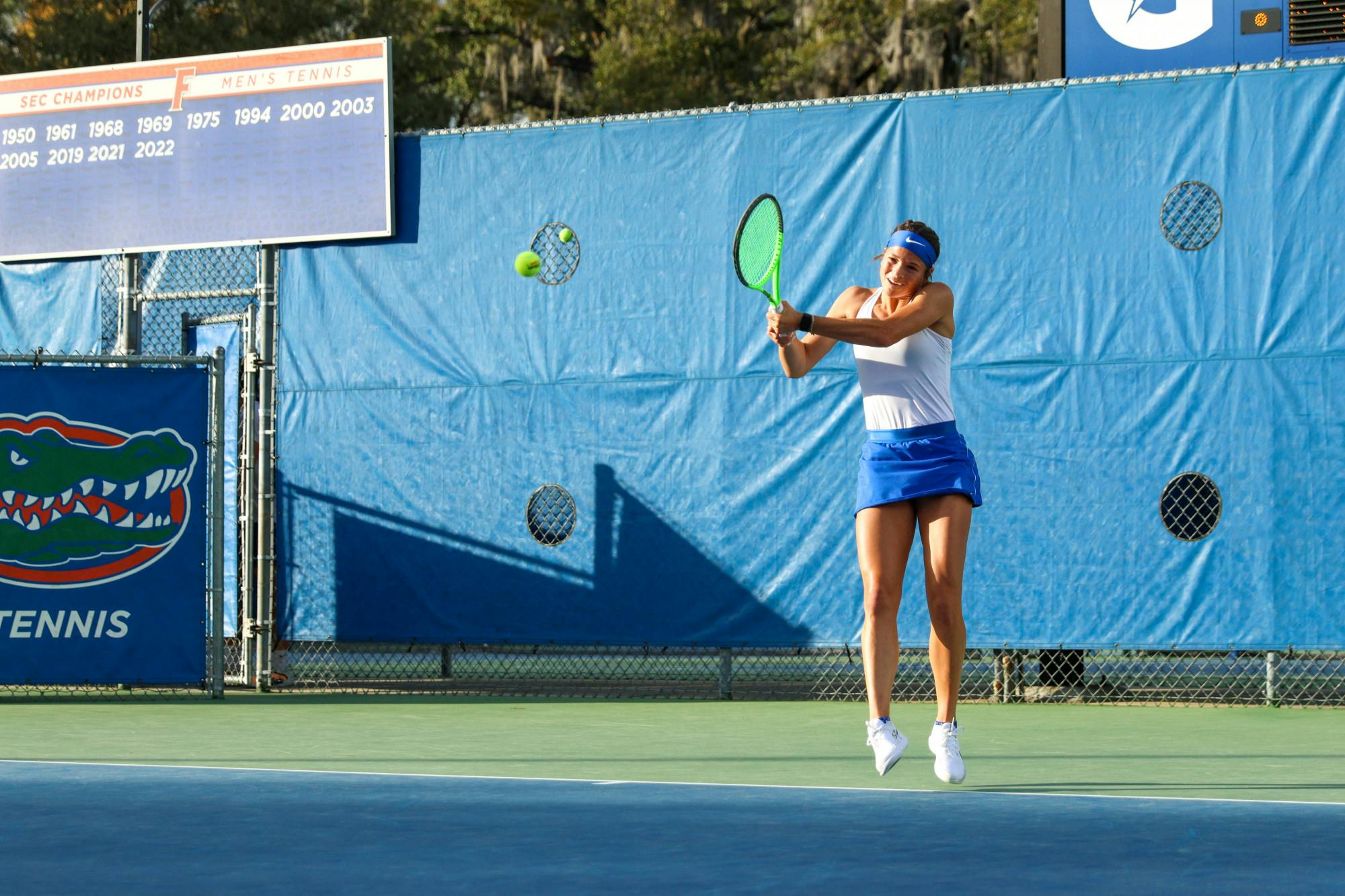 Florida's Emma Shelton hits the ball in the Gators' 4-1 win against the Florida State Seminoles Thursday, Feb. 9, 2023.
