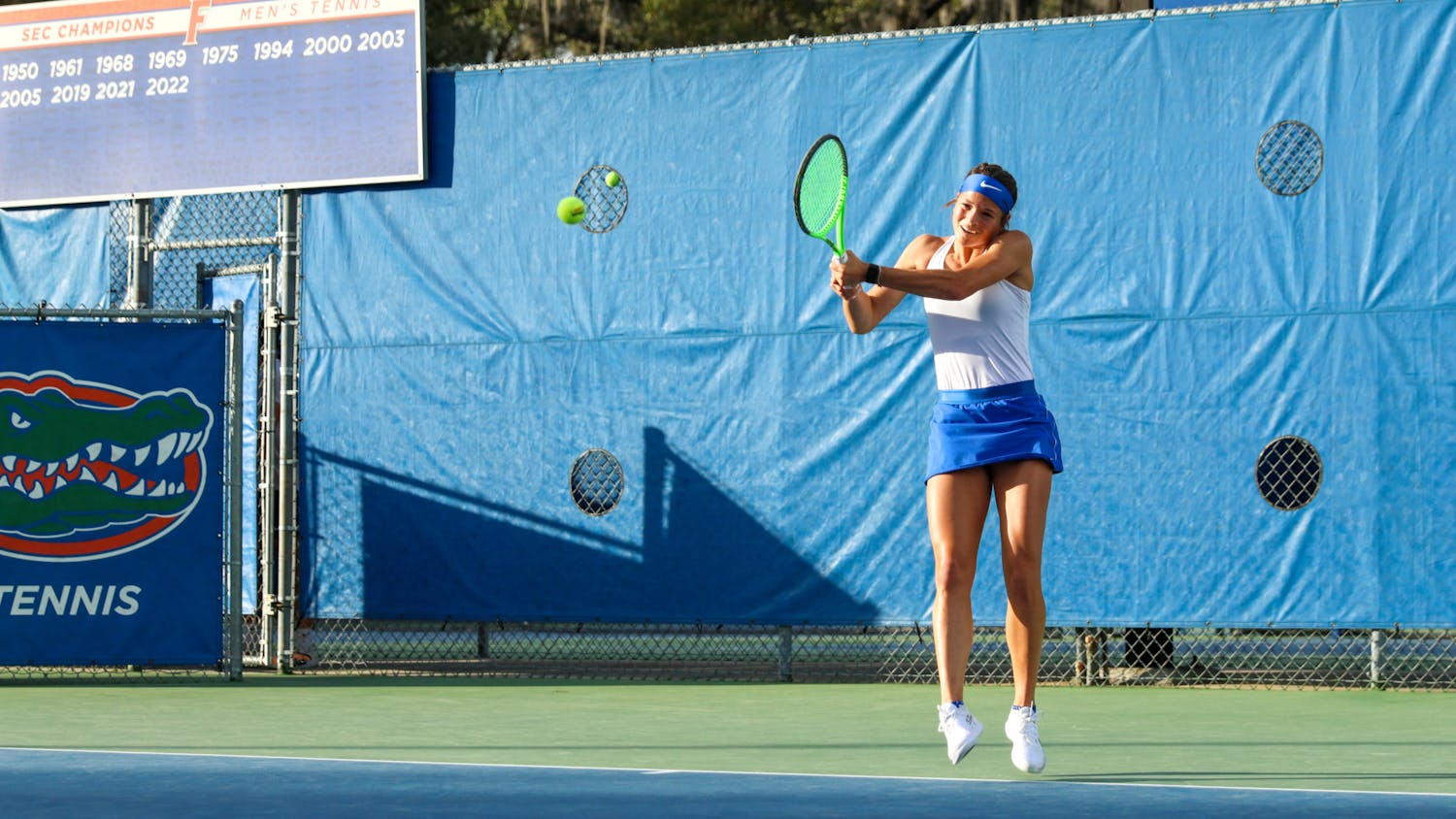 Florida's Emma Shelton hits the ball in the Gators' 4-1 win against the Florida State Seminoles Thursday, Feb. 9, 2023.