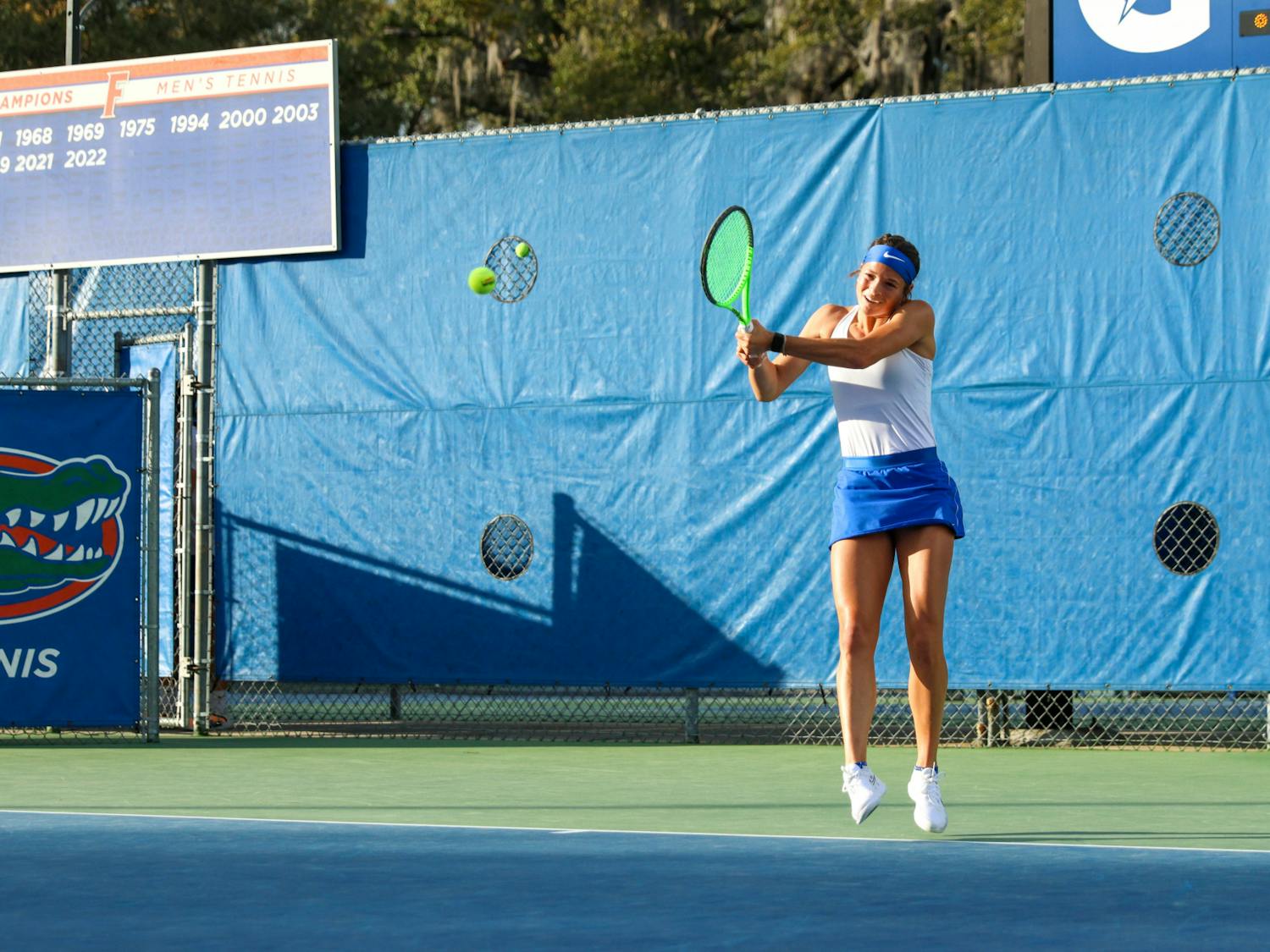 Florida's Emma Shelton hits the ball in the Gators' 4-1 win against the Florida State Seminoles Thursday, Feb. 9, 2023.