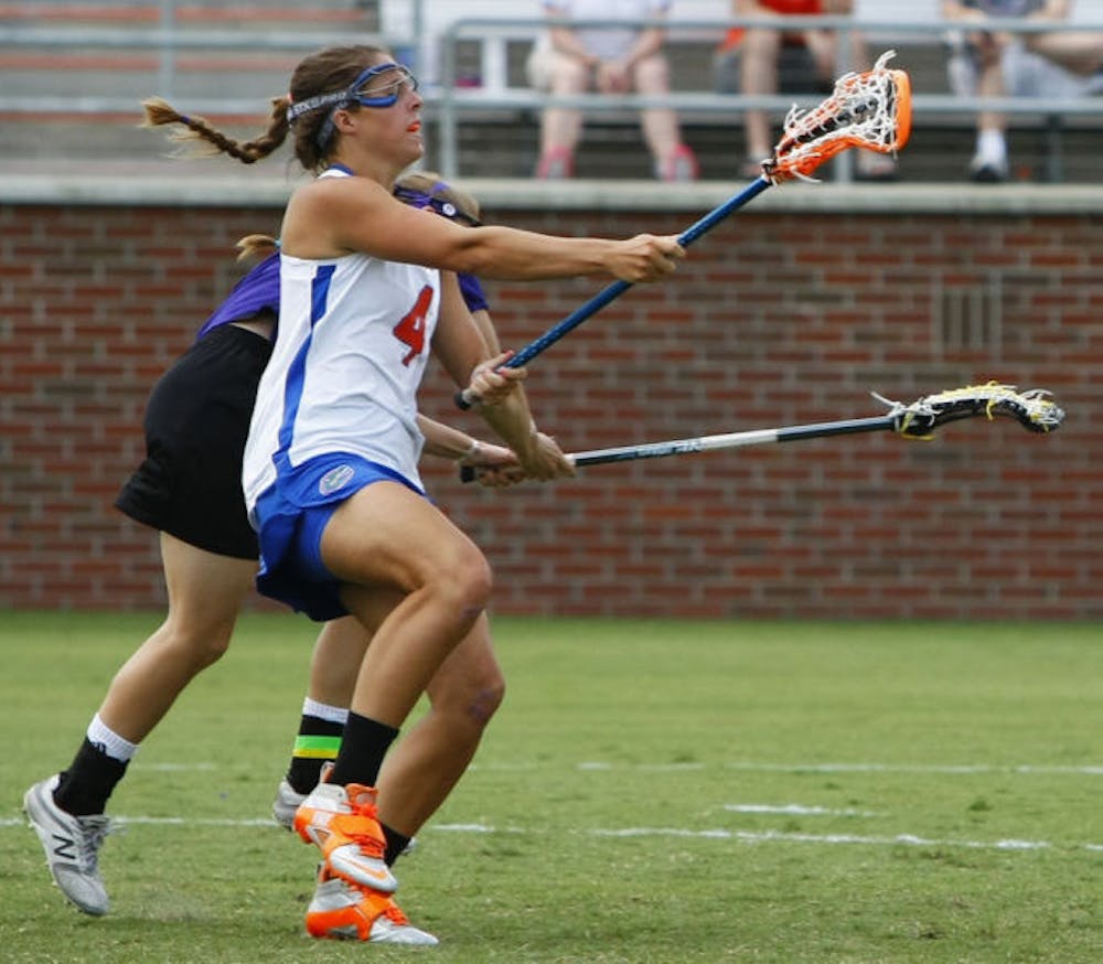 <p>Kitty Cullen attempts a shot during Florida's 14-7 win against Northwestern on May 5 at Dizney Stadium.</p>