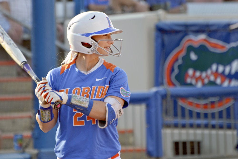 <p>UF junior outfielder Kirsti Merritt smiles as she goes up for an at-bat during Florida's 2-1 win against North Florida on April 1, 2015, at Katie Seashole Pressly Stadium.</p>