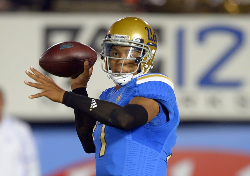 UCLA quarterback Brett Hundley passes during the first half of a 37-10 win against California in Pasadena, Calif., on Oct. 12, 2013.