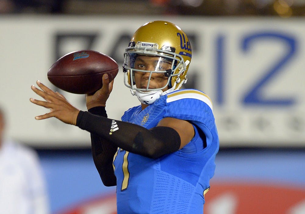 <p>UCLA quarterback Brett Hundley passes during the first half of a 37-10 win against California in Pasadena, Calif., on Oct. 12, 2013.</p>