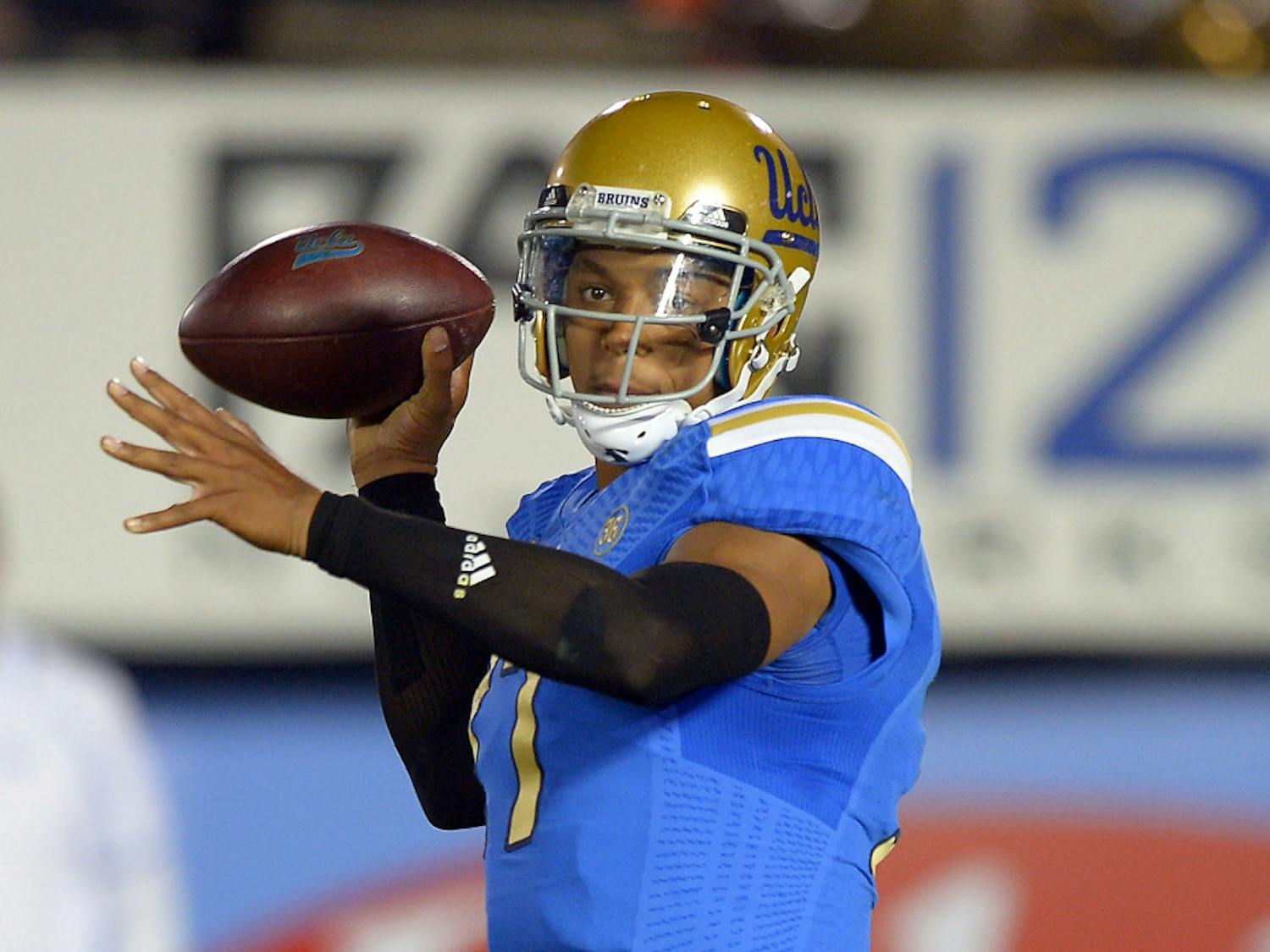 UCLA quarterback Brett Hundley passes during the first half of a 37-10 win against California in Pasadena, Calif., on Oct. 12, 2013.