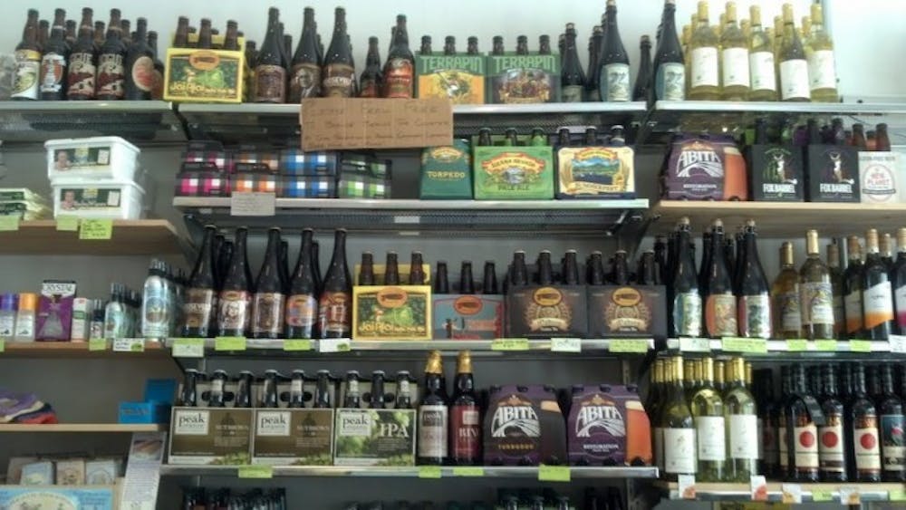 <p>Filling five shelves right behind the checkout counter, the co-op’s beer, wine and cider collection is a welcome sight to beer lovers who also want to help support the local economy.</p>