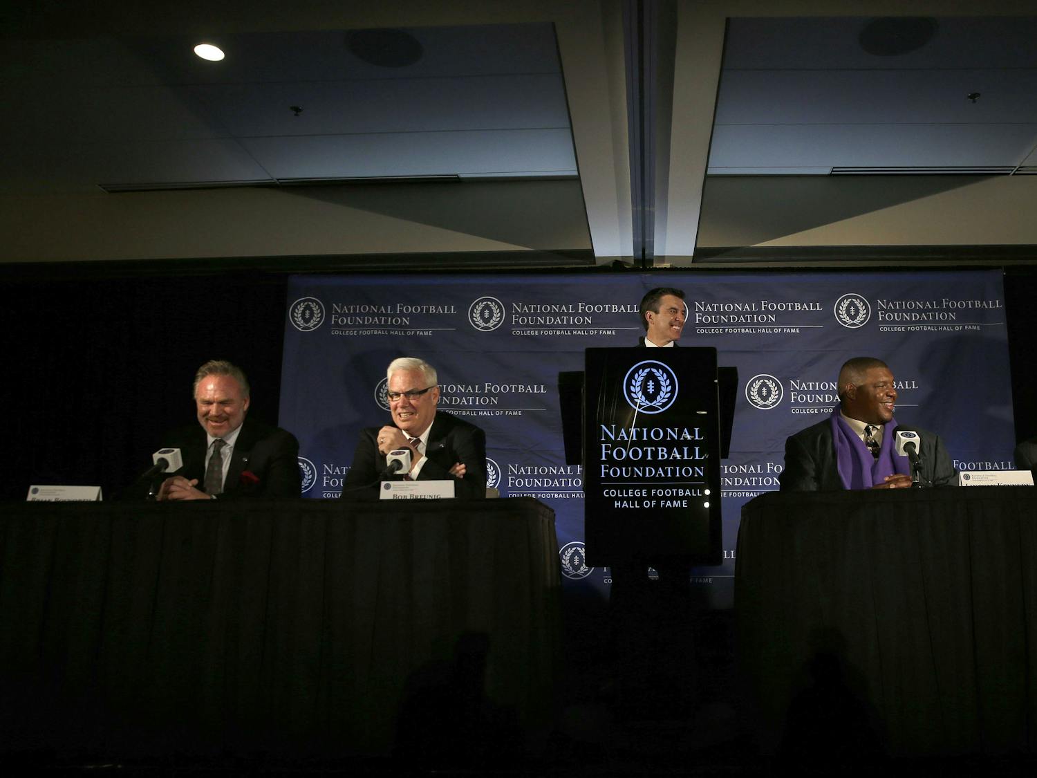 Kansas State head football coach Bill Snyder, right, speaks as from left, Brian Bosworth, Bob Breunig, Reese Davis and Lincoln Kennedy laugh during a news conference announcing the 2015 College Football Hall of Fame Class on Jan. 9, 2015, in Dallas.