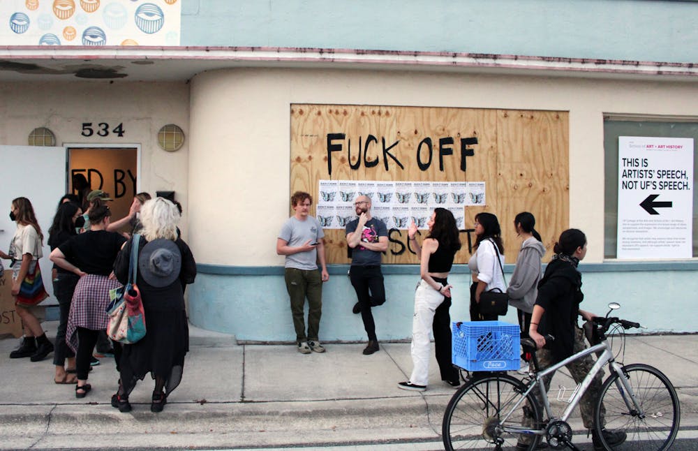 <p>About 100 people gathered at the WARPhaus to condemn prisoner solidarity and UF’s censorship at the Burn It Down: Communications of Resistance Wednesday, March 29, 2023.</p>