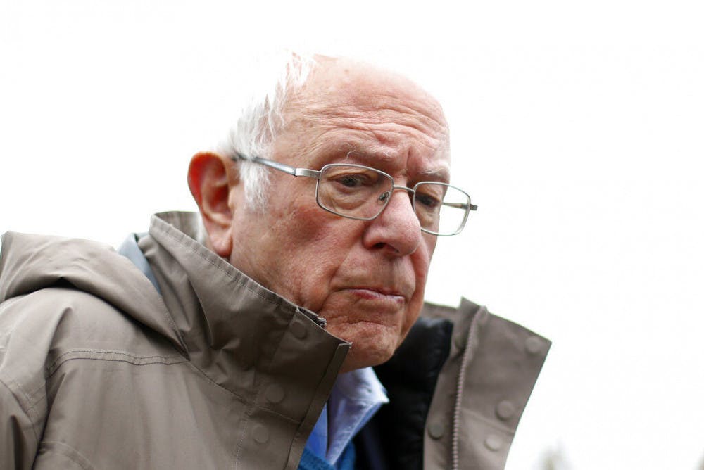 <p>FILE - In this March 10, 2020, file photo Democratic presidential candidate Sen. Bernie Sanders, I-Vt., visits outside a polling location at Warren E. Bow Elementary School in Detroit. (AP Photo/Paul Sancya, File)</p>