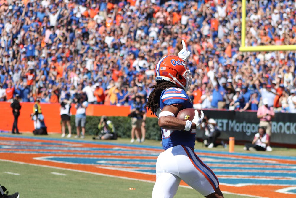 Florida redshirt sophomore cornerback Jaydon Hill returns his first career interception 49 yards for a touchdown in the first quarter of the Gators' win over the Missouri Tigers Saturday, Oct. 8, 2022. 