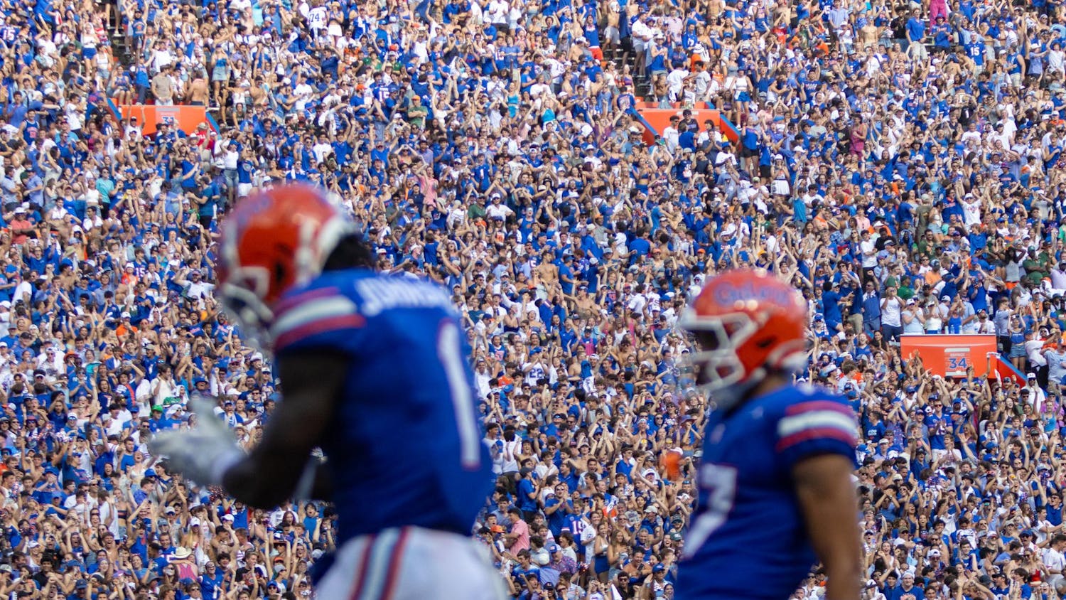 Fans celebrate a long touchdown run by Florida Gators running back Montrell Johnson Jr. (1) at Steve Spurrier-Florida Field at Ben Hill Griffin Stadium on Saturday, Aug. 31, 2024.