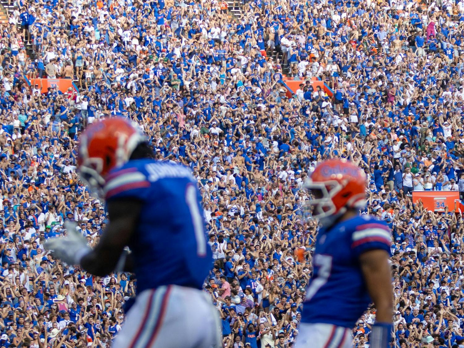 Fans celebrate a long touchdown run by Florida Gators running back Montrell Johnson Jr. (1) at Steve Spurrier-Florida Field at Ben Hill Griffin Stadium on Saturday, Aug. 31, 2024.