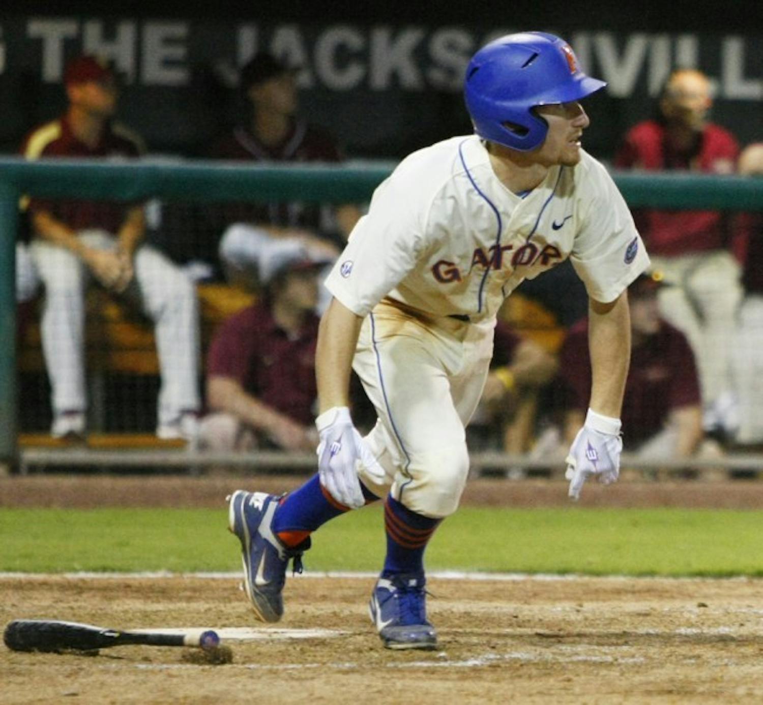 Florida freshman second baseman Casey Turgeon watches as his sixth-inning triple soars toward center fielder James Ramsey. Turgeon’s two RBI on the hit proved to be the winning runs in UF’s 4-1 victory against FSU.