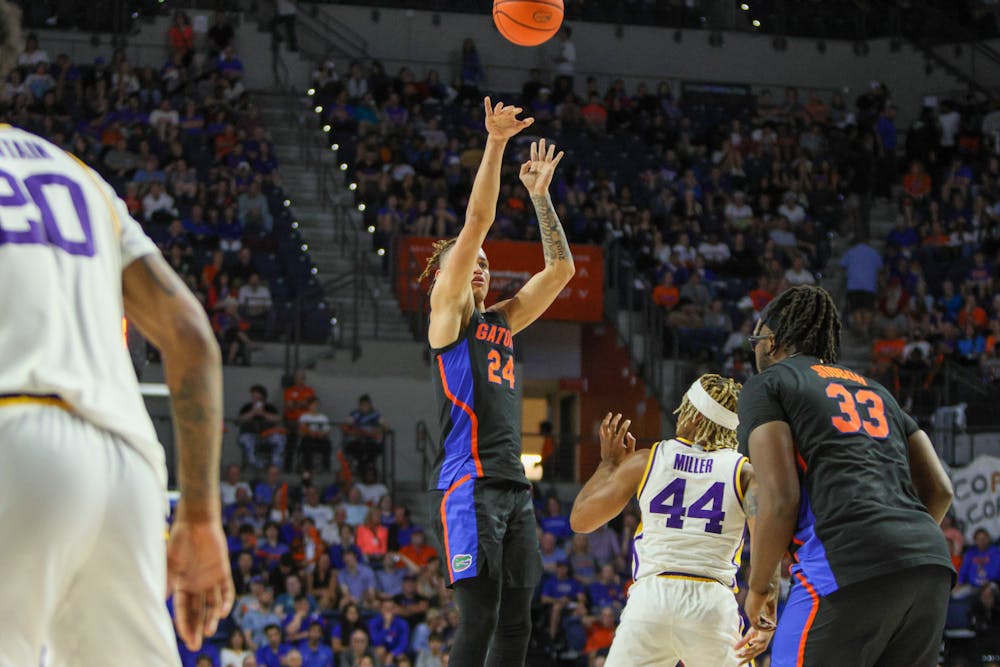 Florida guard Riley Kugel takes a jump shot in the Gators' 79-67 win against the Louisiana State Tigers Saturday, March 4, 2023.