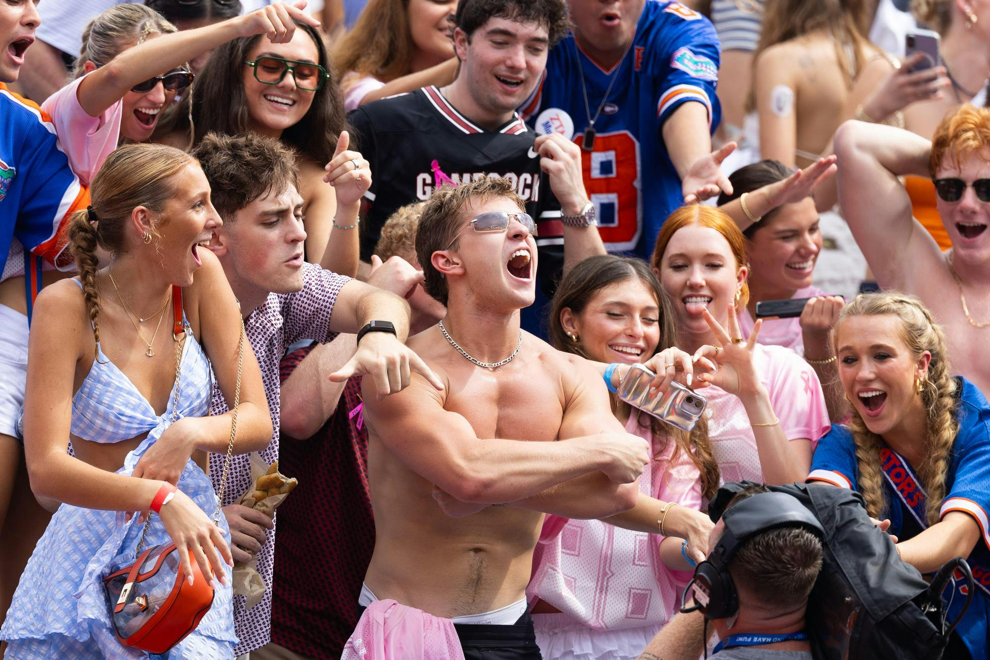 An attendant of the Florida versus South Carolina NCAA football game flexes during the first half, Saturday, Oct. 10, 2026, in Gainesville, Fla.